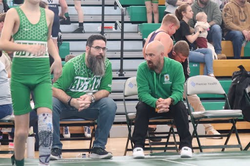 Michael Jividen coaching wrestling during a local meet